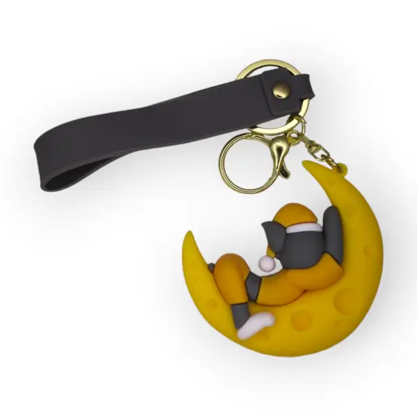 Tom Sleeping on Moon Silicone Keychain - Image 3